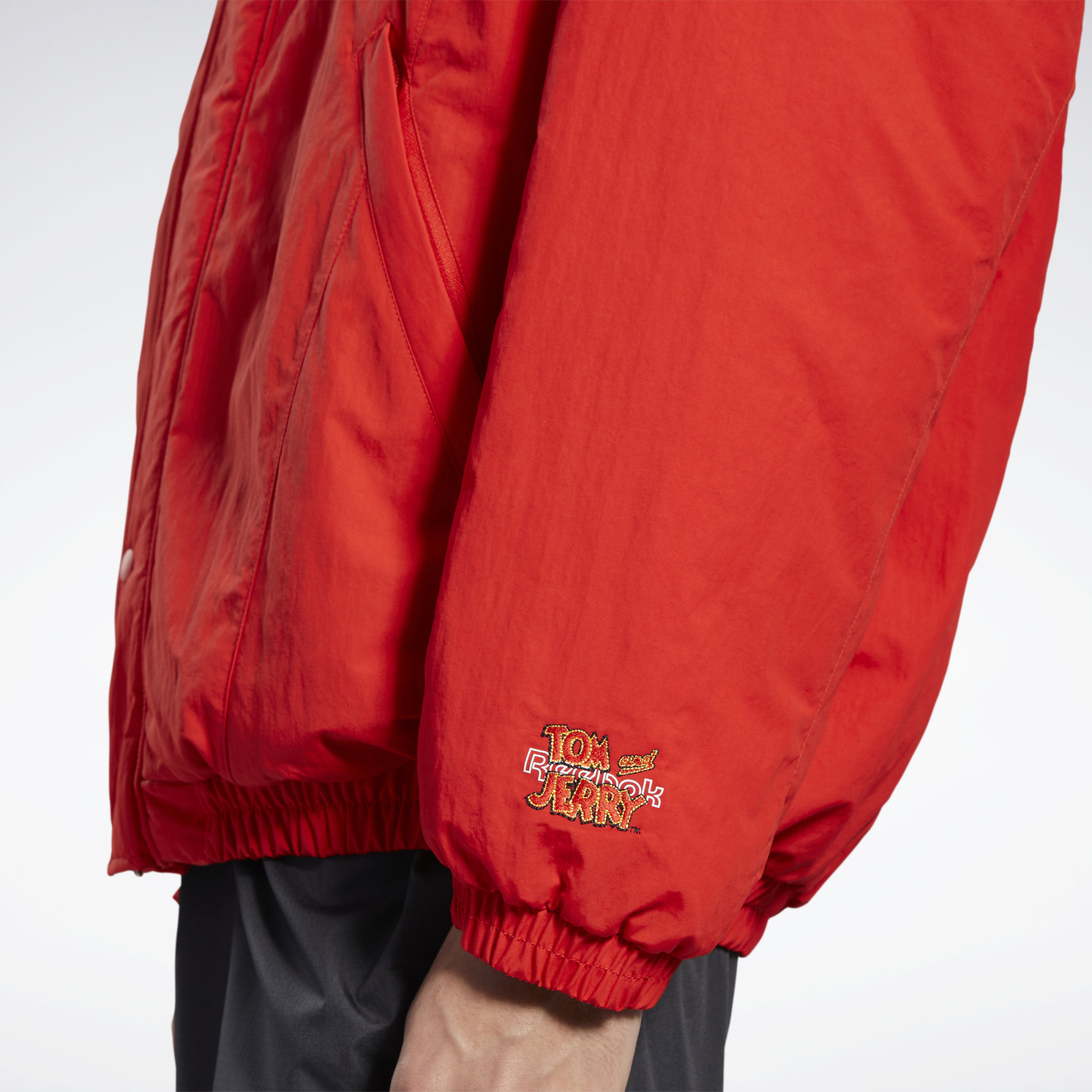 REEBOK X TOM AND JERRY WOVEN JACKET MOTOR RED - GJ0476 – The